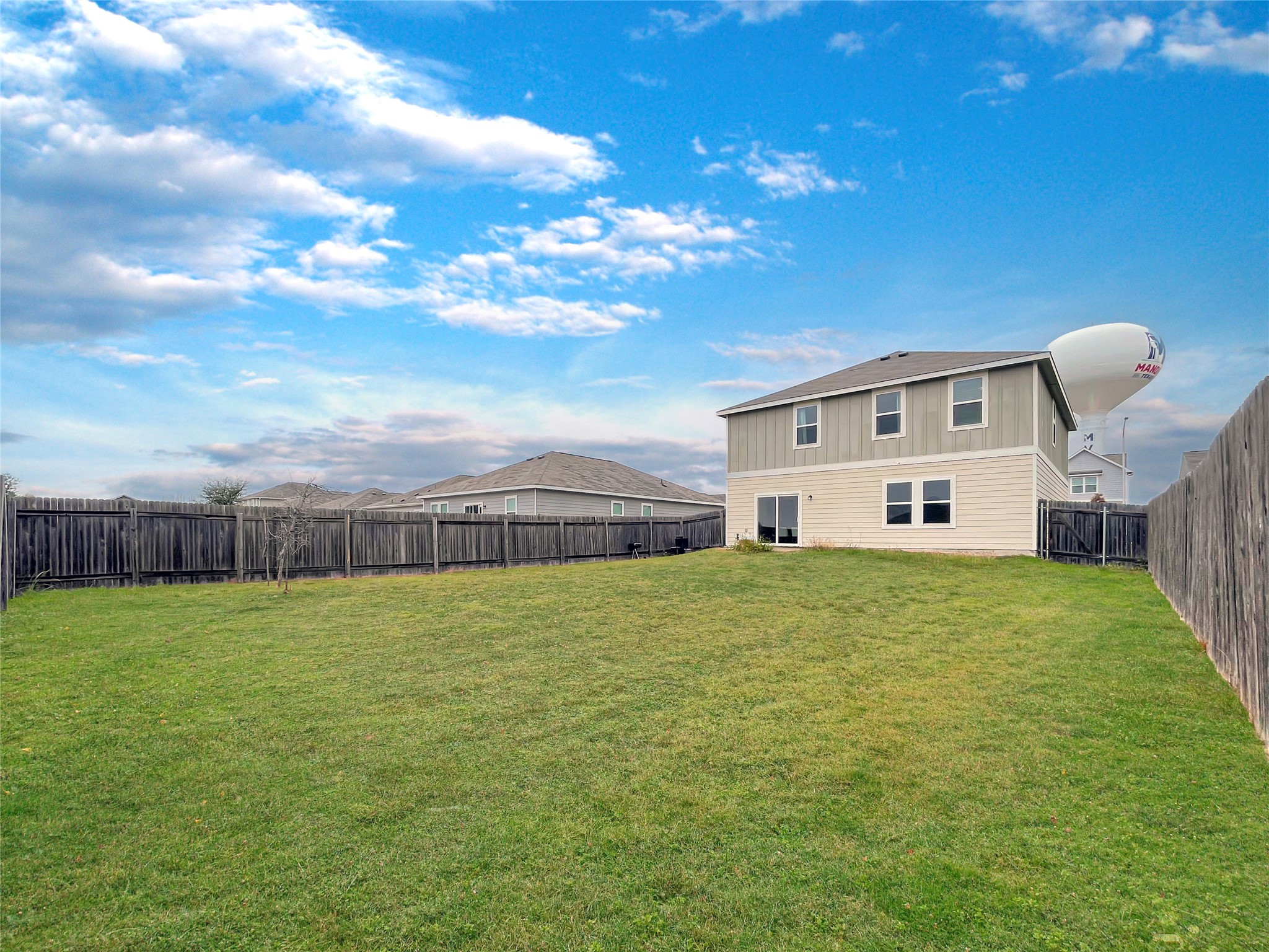 19221 Nathan Scott Way Manor, TX 78653 - Photo 15 of 15 a view of a couches in front of a house