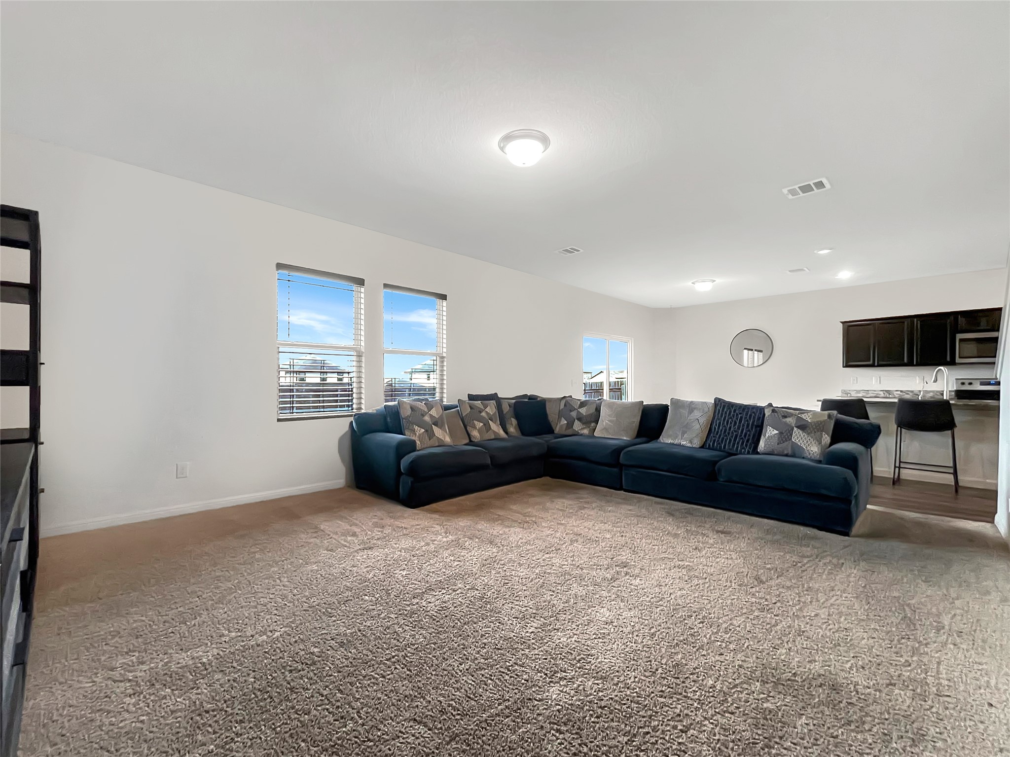 19221 Nathan Scott Way Manor, TX 78653 - Photo 9 of 15 a living room with furniture and a flat screen tv