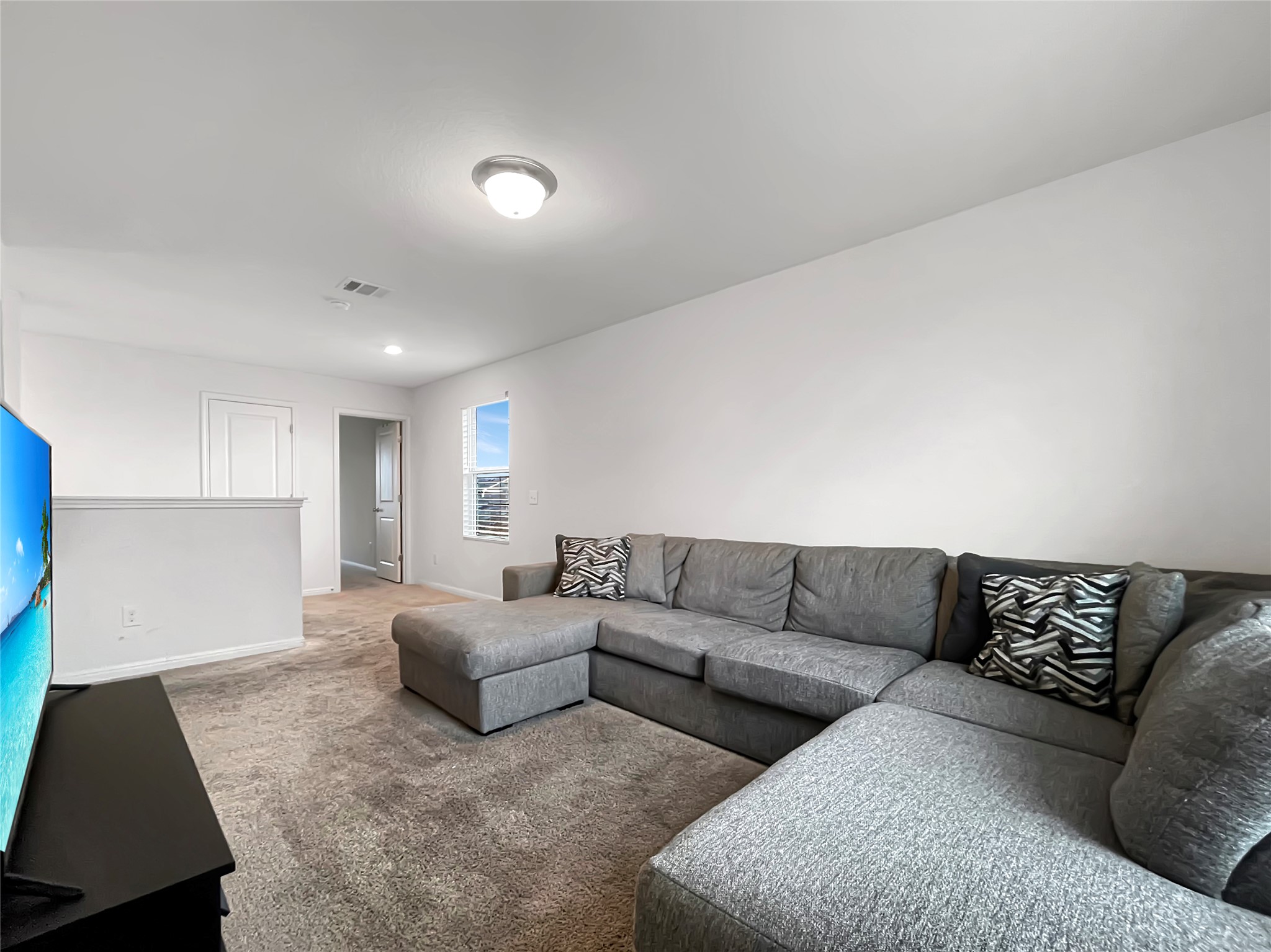 19221 Nathan Scott Way Manor, TX 78653 - Photo 10 of 15 a living room with furniture and a couch