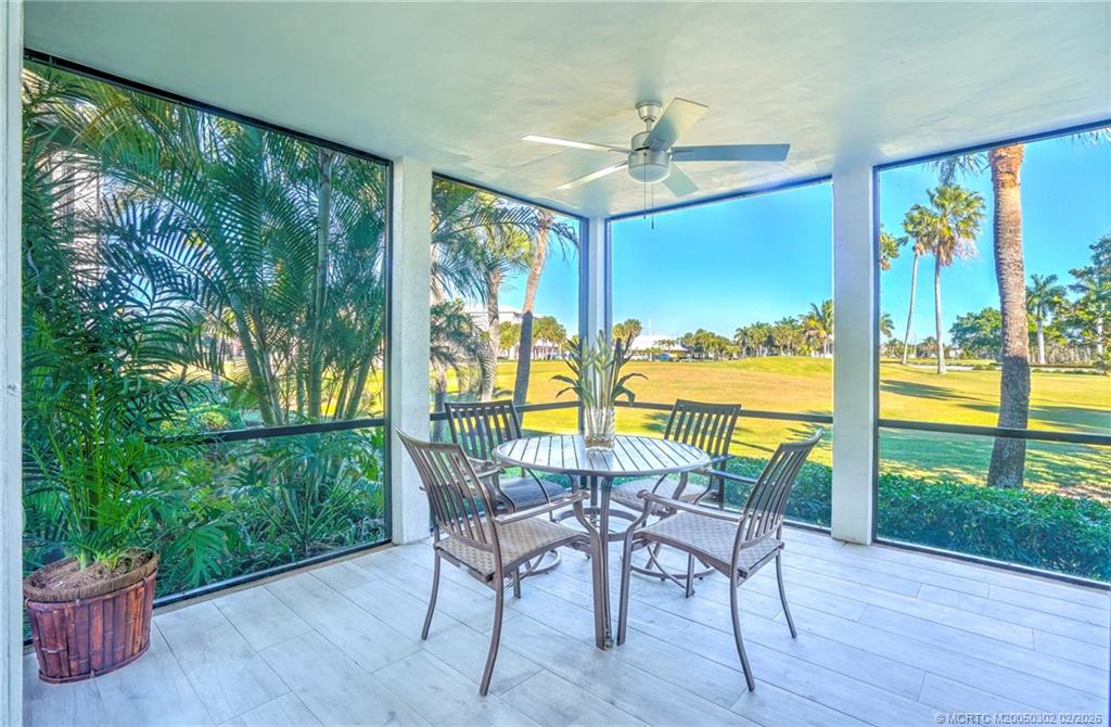 331 Golfview Circle Stuart, FL 34996 - Photo 16 of 48 a view of a dining room with furniture window and outside view