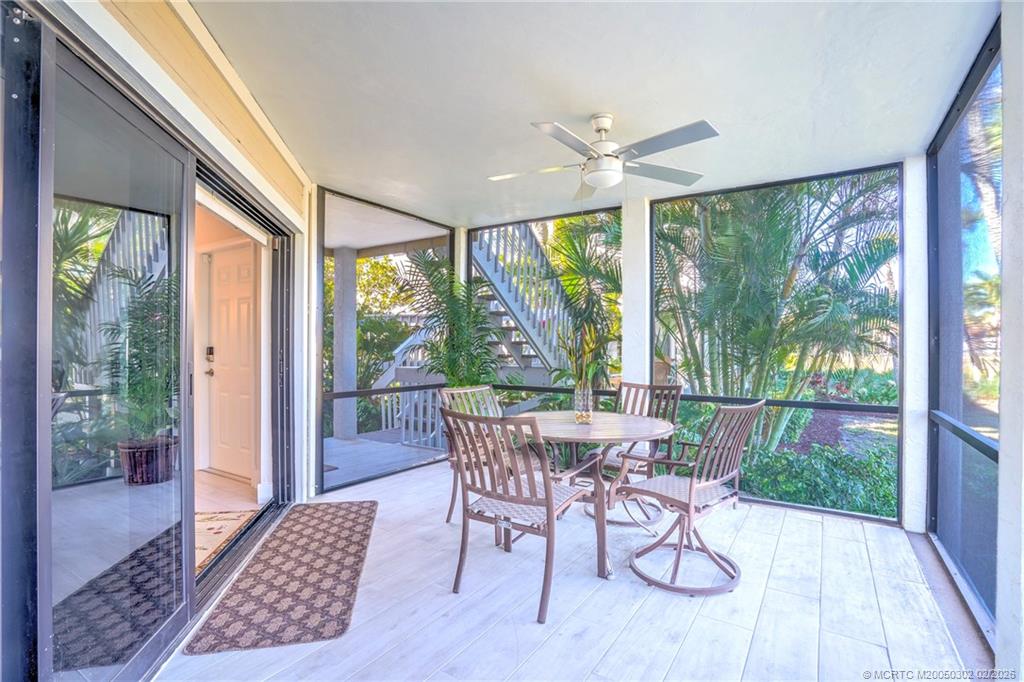 331 Golfview Circle Stuart, FL 34996 - Photo 19 of 48 a dining room with furniture window and outside view