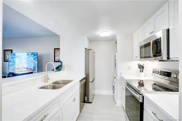 a bathroom with a sink and mirror