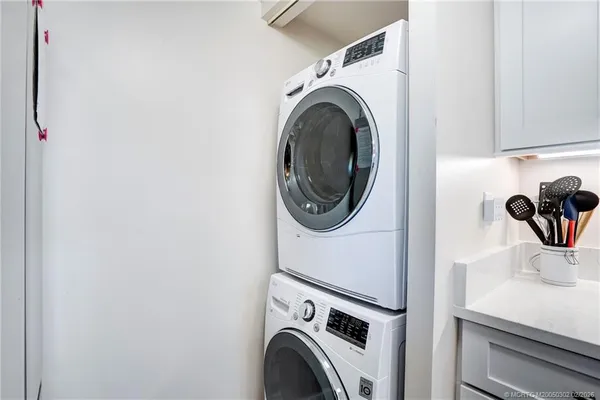 a kitchen with a stove and a microwave