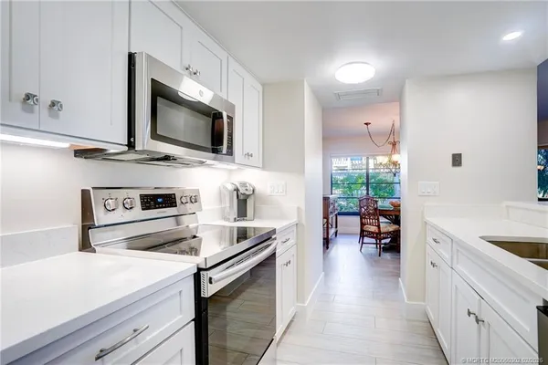 a view of a living room and a porch