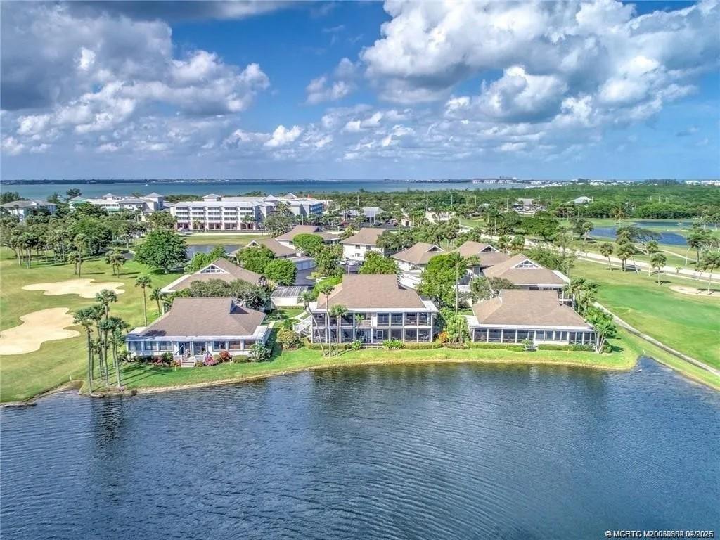 331 Golfview Circle Stuart, FL 34996 - Photo 39 of 39 a view of a swimming pool and an outdoor seating