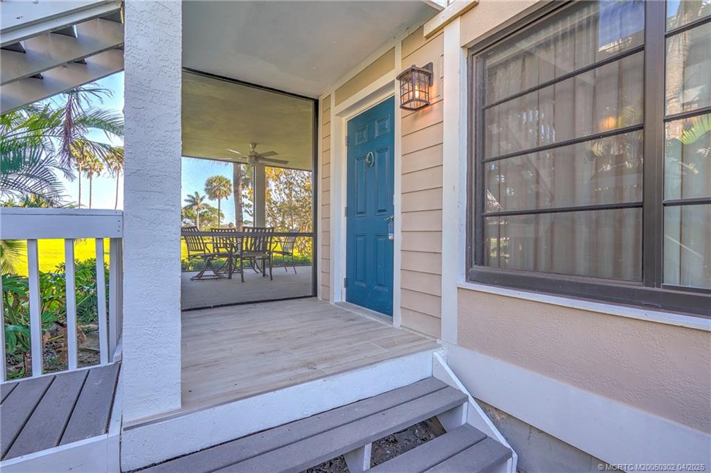 331 Golfview Circle Stuart, FL 34996 - Photo 6 of 39 a view of an outdoor space with a window