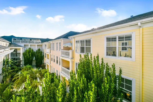a view of a pathway both side of the house