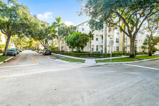 a view of a dining room with furniture and a flat screen tv
