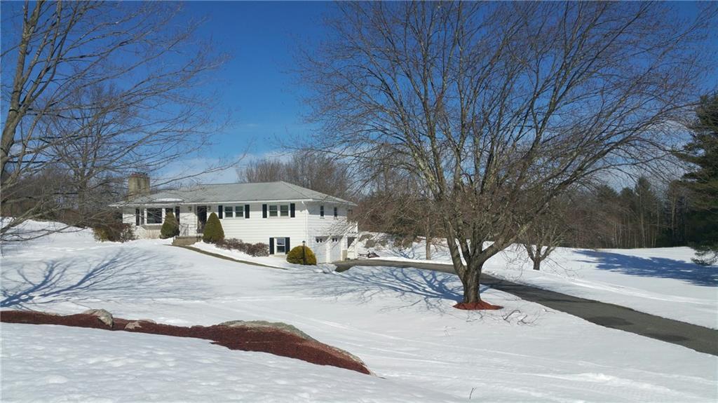 56 Davis Road Harwinton, CT 06791 - Photo 1 of 1 a front view of a house with a yard