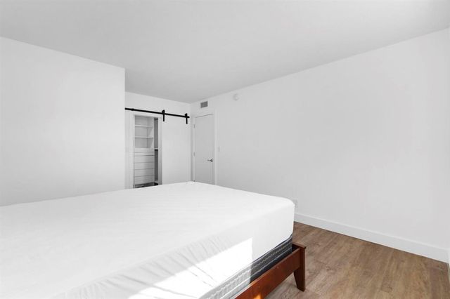 a bathroom with a shower and a toilet