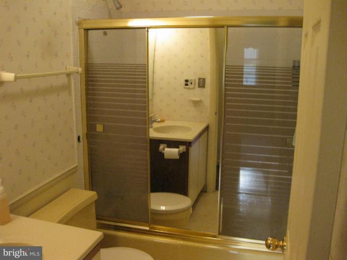 3734 Grave Run Road Manchester, MD 21102 - Photo 2 of 26 a bathroom with a shower and a sink