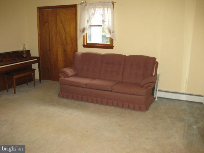3734 Grave Run Road Manchester, MD 21102 - Photo 23 of 26 a living room with furniture and a window