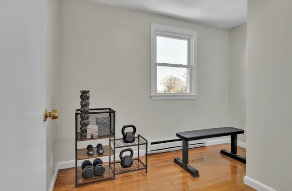 a room with furniture and a window