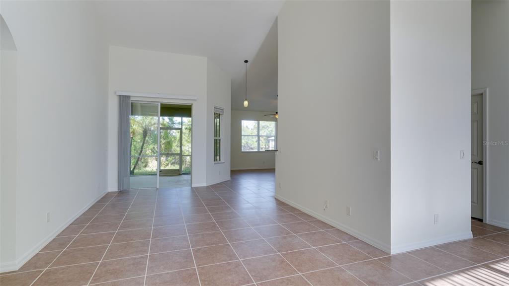 5279 Lovett Road North Port, FL 34288 - Photo 3 of 21 a view of an empty room with window and bathroom