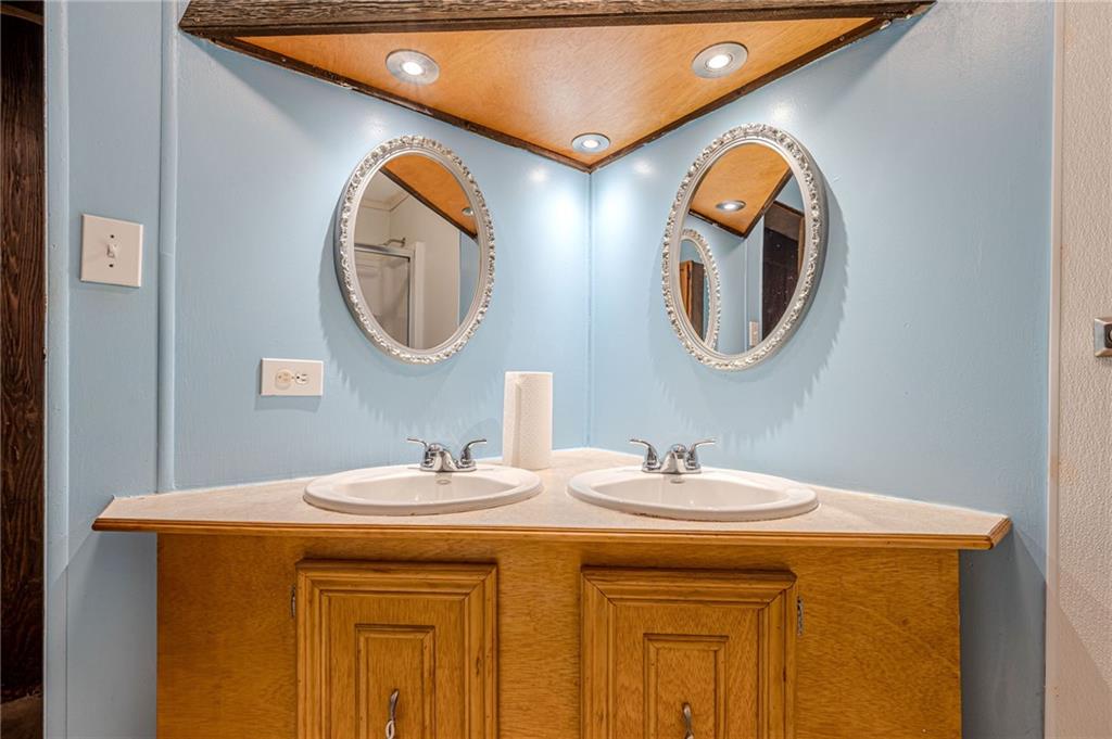90 Valley Trail Southeast Acworth, GA 30101 - Photo 14 of 28 a bathroom with a sink and a mirror
