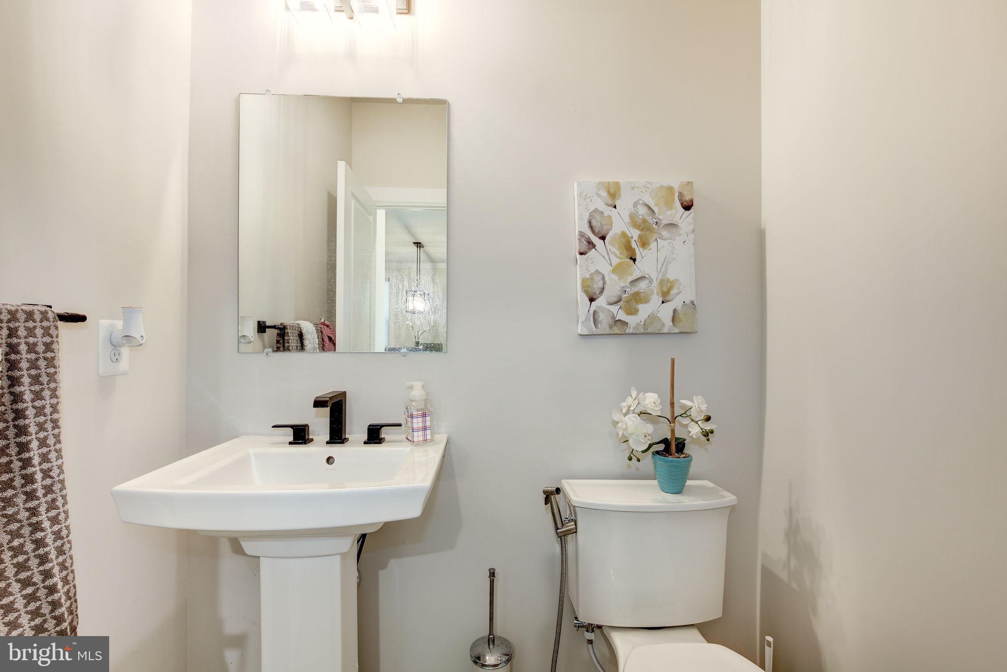 6547 Clubhouse Boulevard Laurel, MD 20708 - Photo 17 of 86 Main level Half Bath
