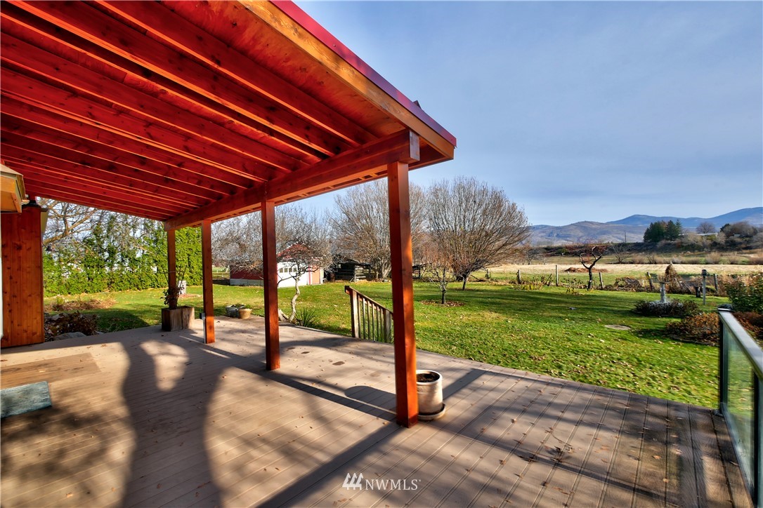 78 Woods Road Omak, WA 98841 - Photo 27 of 40 a view of a house with backyard