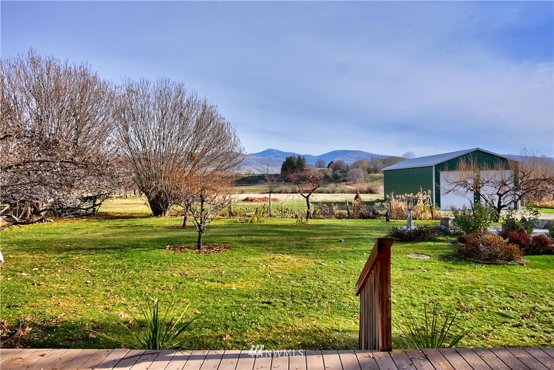 78 Woods Road Omak, WA 98841 - Photo 28 of 40 a view of a garden with an outdoor space