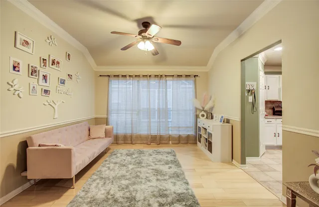 a bathroom with a tub shower and sink