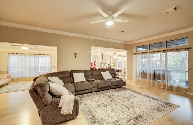 a living room with furniture and a rug