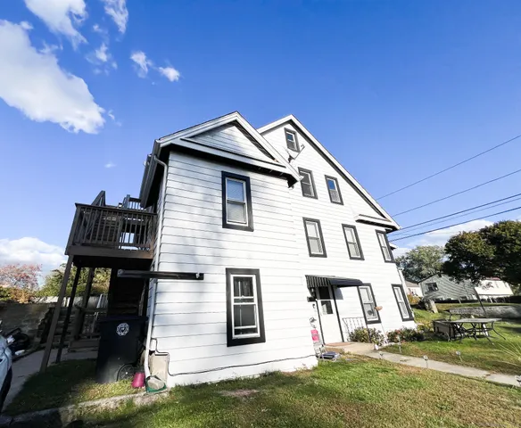 a house view with a garden space