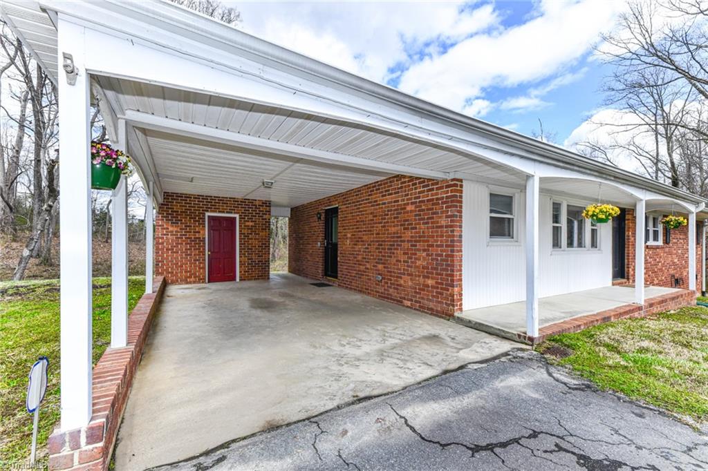 8302 Cadet Drive Oak Ridge, NC 27310 - Photo 12 of 42 Carport