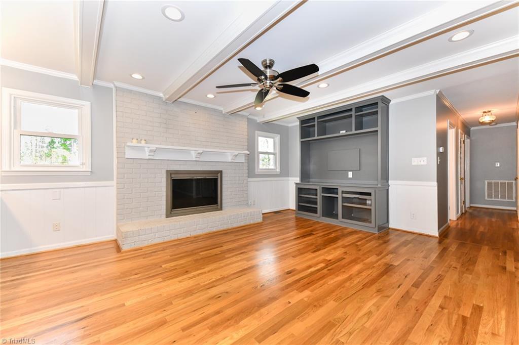 8302 Cadet Drive Oak Ridge, NC 27310 - Photo 17 of 42 Built in Entertainment space