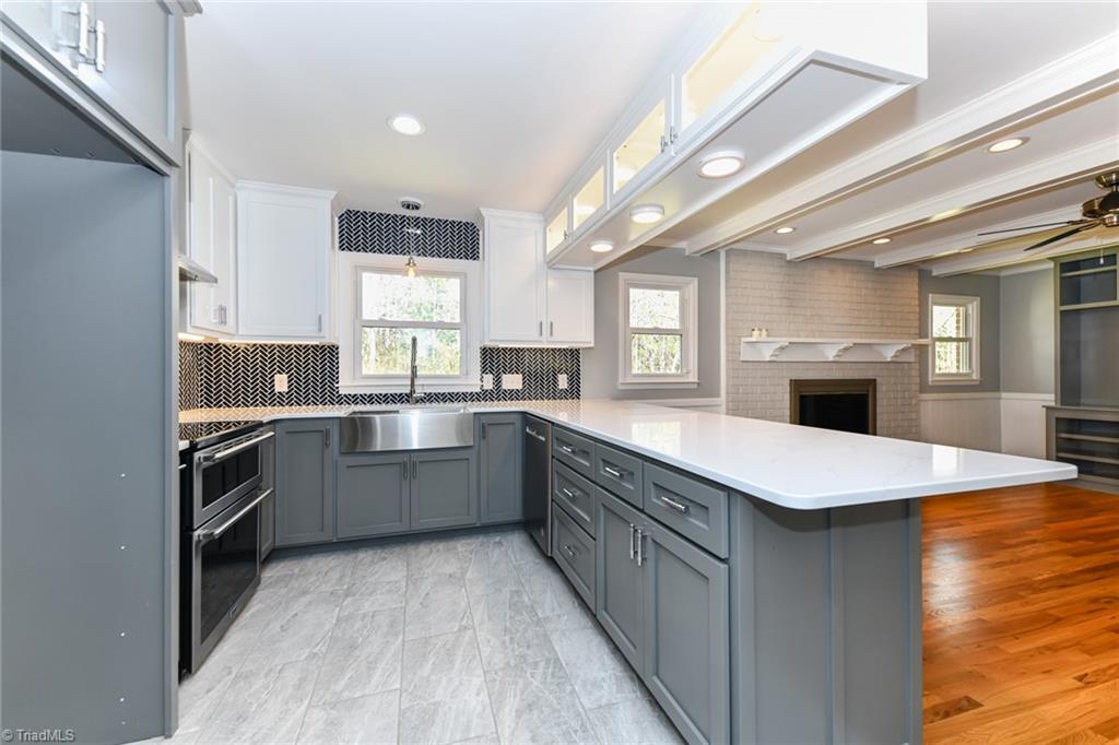 8302 Cadet Drive Oak Ridge, NC 27310 - Photo 22 of 42 Extended bar for seating