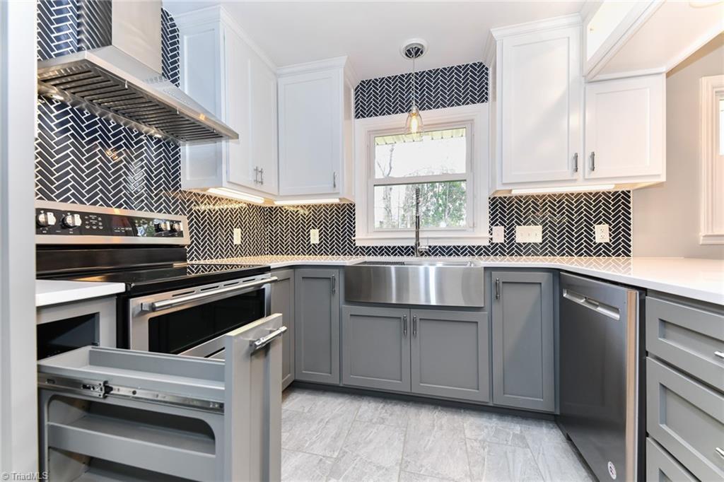 8302 Cadet Drive Oak Ridge, NC 27310 - Photo 24 of 42 Built in spice rack