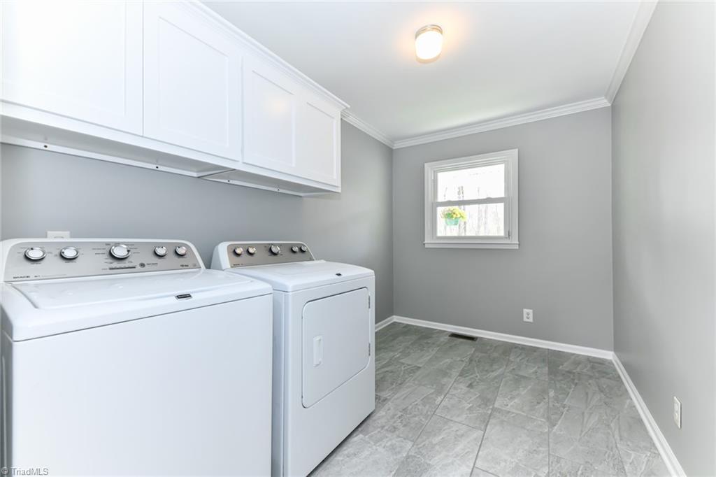 8302 Cadet Drive Oak Ridge, NC 27310 - Photo 27 of 42 Huge Laundry Room Lots of Extra Panty space