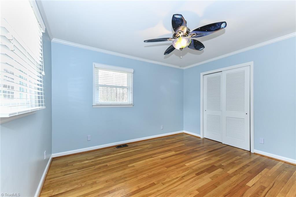 8302 Cadet Drive Oak Ridge, NC 27310 - Photo 30 of 42 3rd Bedroom with Ceiling Fan