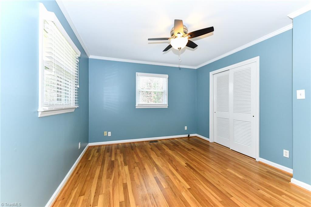 8302 Cadet Drive Oak Ridge, NC 27310 - Photo 35 of 42 Ceiling fan and Hardwoods