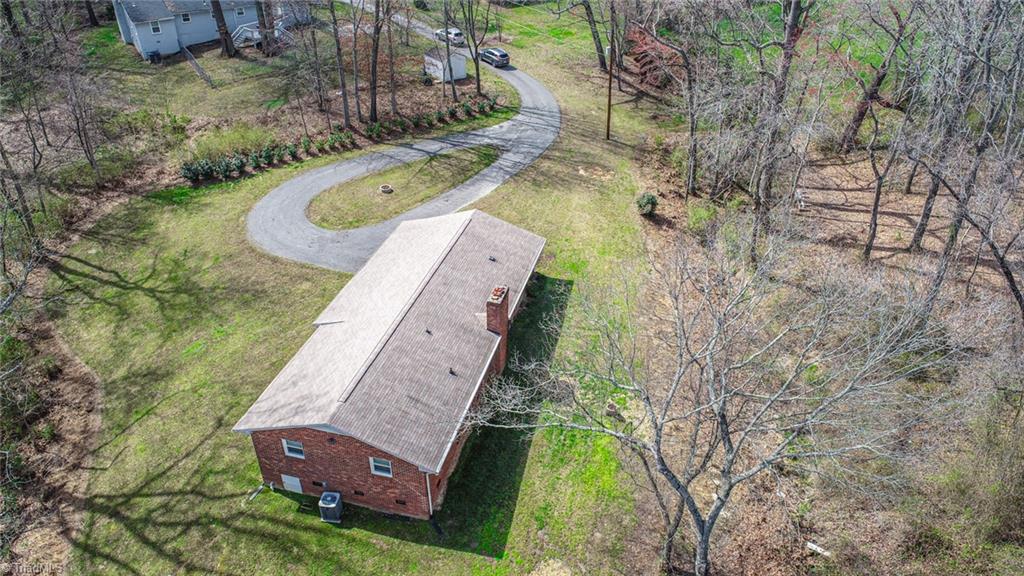 8302 Cadet Drive Oak Ridge, NC 27310 - Photo 5 of 42 Private Circular paved Driveway