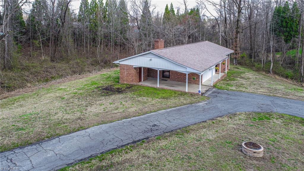 8302 Cadet Drive Oak Ridge, NC 27310 - Photo 7 of 42 There is a fire pit for entertaining!!