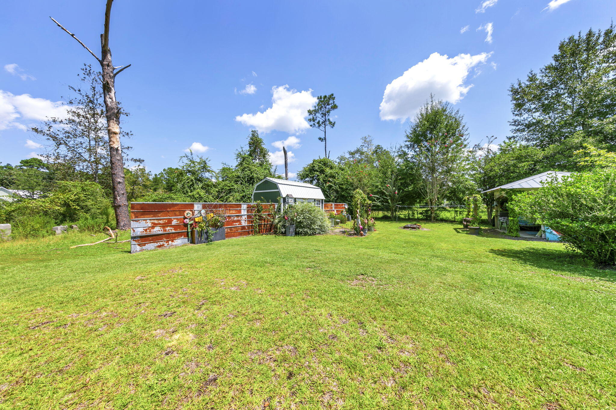 90 Jones Drive Freeport, FL 32439 - Photo 25 of 31 a view of a house with a big yard