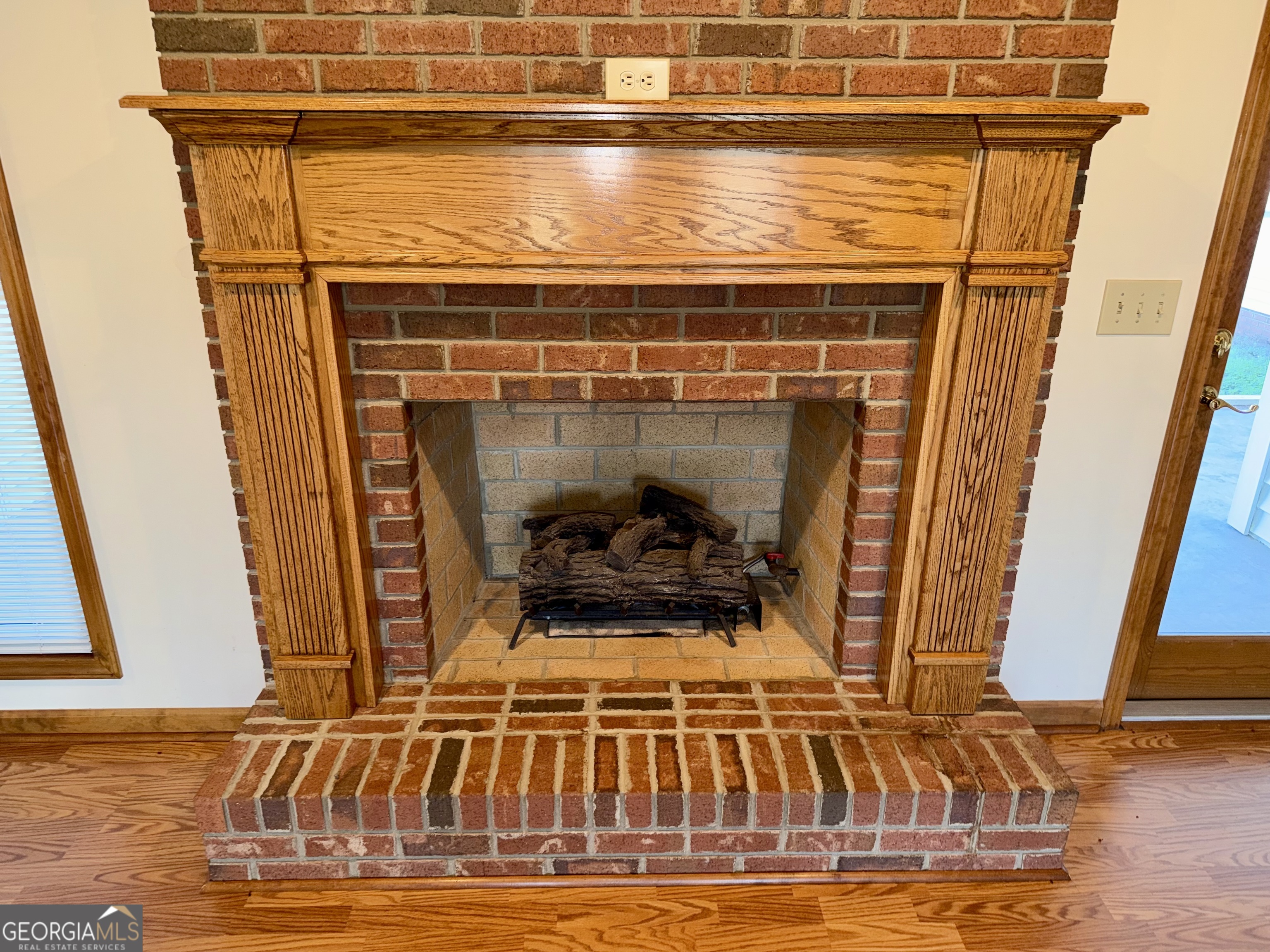 494 Broad Street Bowman, GA 30624 - Photo 16 of 65 a view of a fireplace