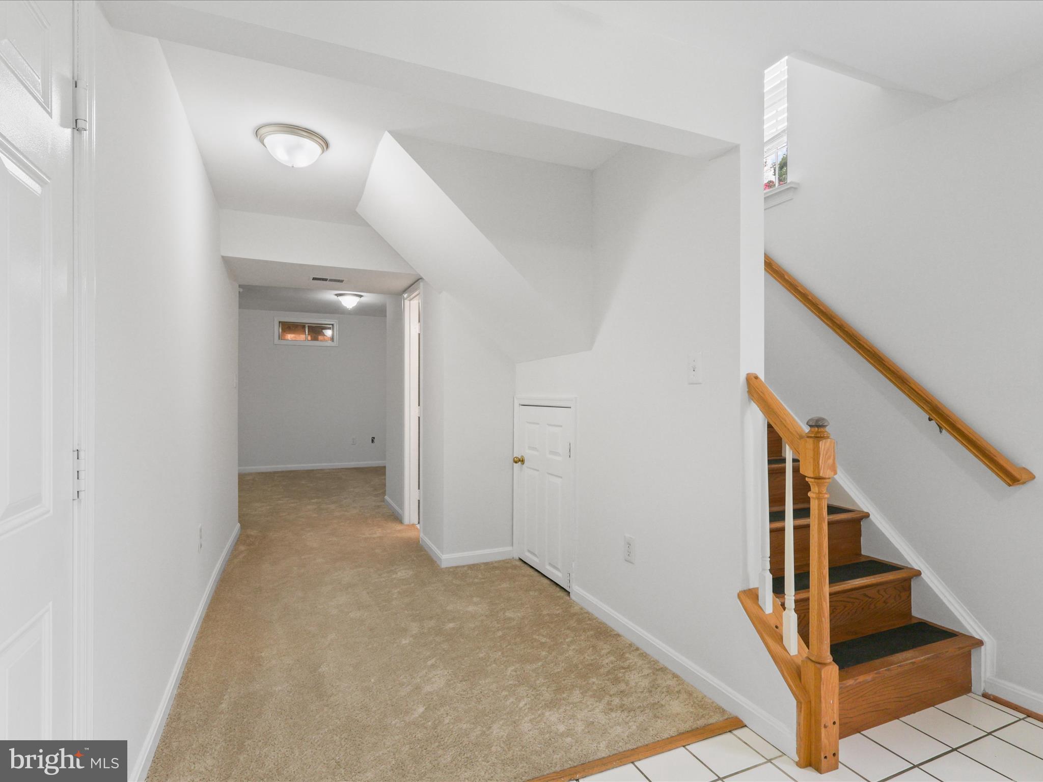 7700 Shadowcreek Terrace Springfield, VA 22153 - Photo 14 of 44 a view of a hallway view with staircase