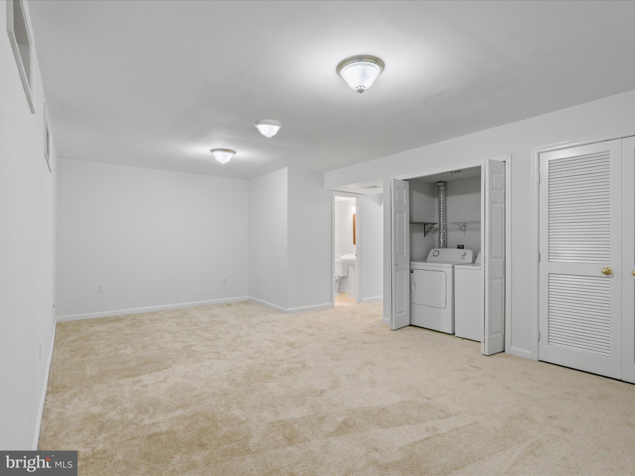 7700 Shadowcreek Terrace Springfield, VA 22153 - Photo 16 of 44 an empty room with a bathroom