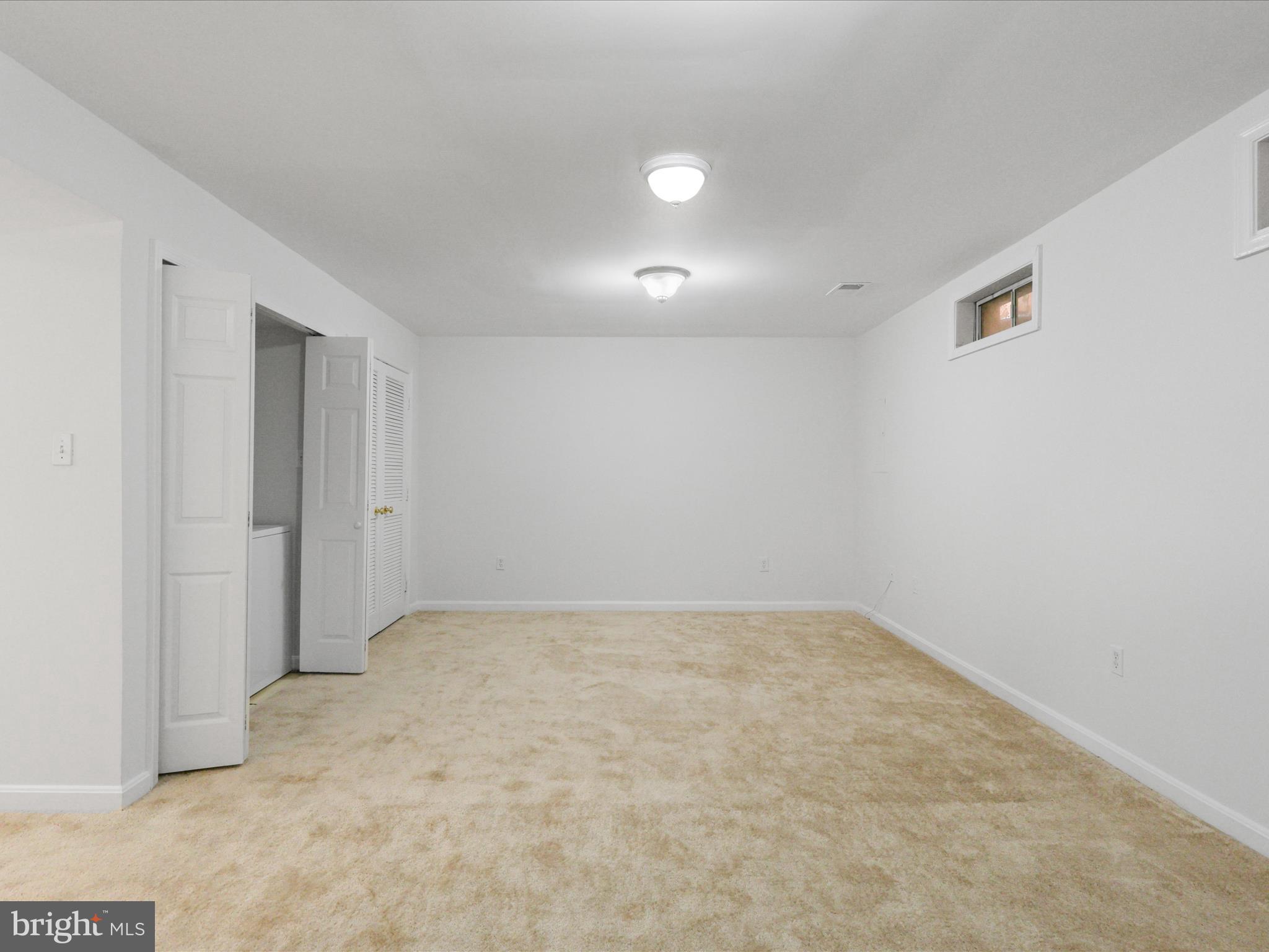 7700 Shadowcreek Terrace Springfield, VA 22153 - Photo 18 of 44 an empty room with a natural light
