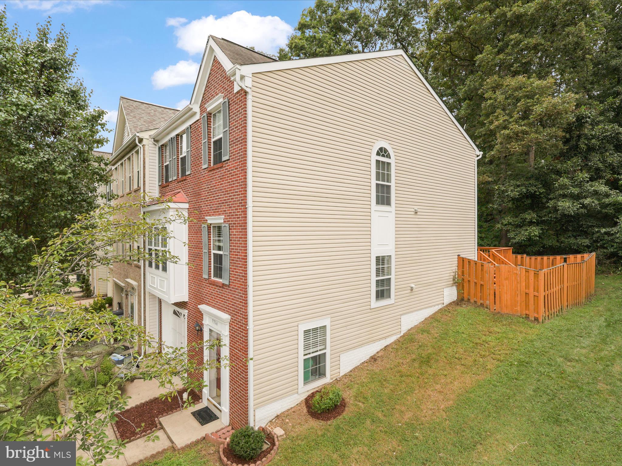 7700 Shadowcreek Terrace Springfield, VA 22153 - Photo 2 of 44 a view of a house with backyard and trees