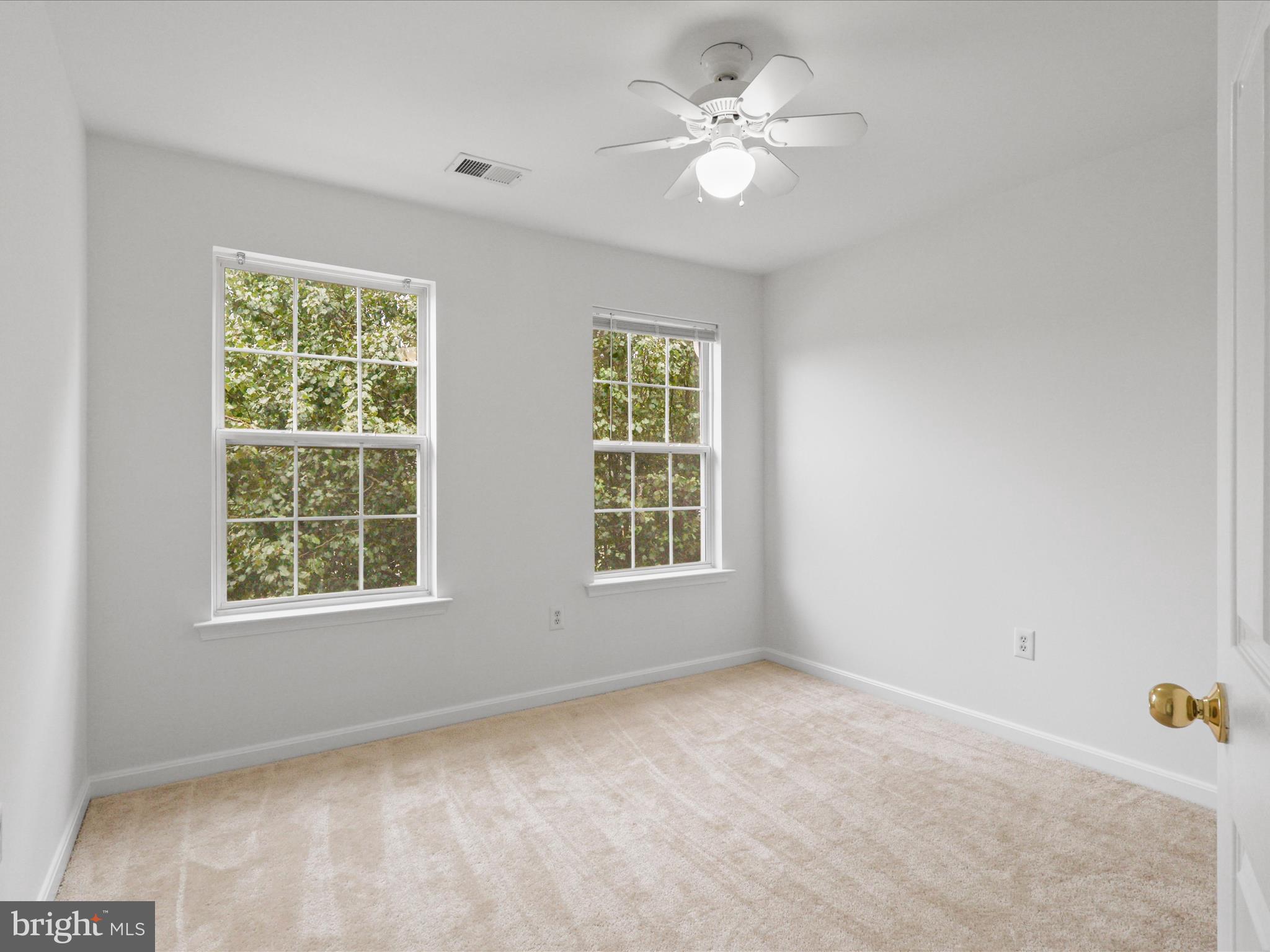 7700 Shadowcreek Terrace Springfield, VA 22153 - Photo 30 of 44 a view of an empty room with a window