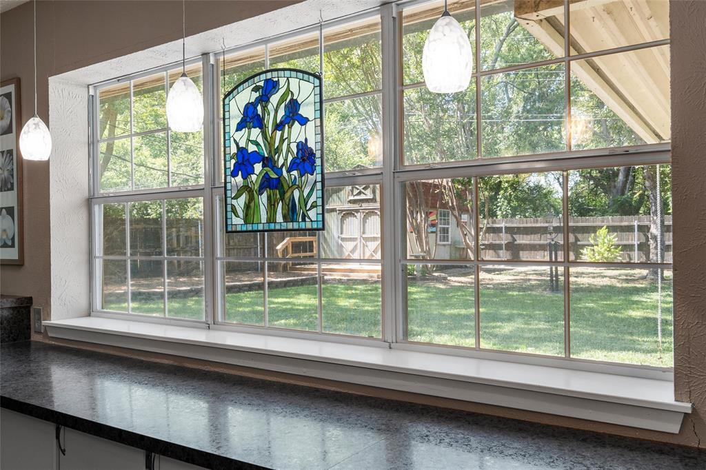 105 Gail Drive Waco, TX 76708 - Photo 12 of 36 a view of a garden from a window