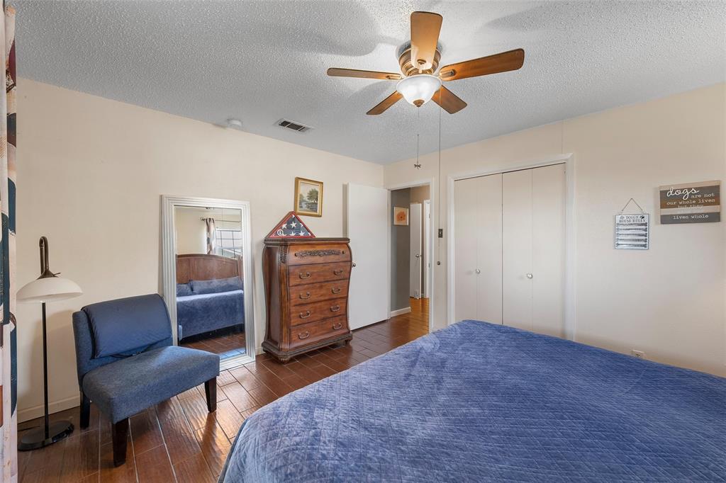 105 Gail Drive Waco, TX 76708 - Photo 15 of 36 a bedroom with furniture and a ceiling fan