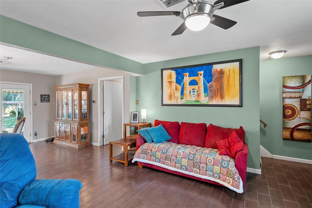 105 Gail Drive Waco, TX 76708 - Photo 21 of 36 a living room with furniture and wooden floor