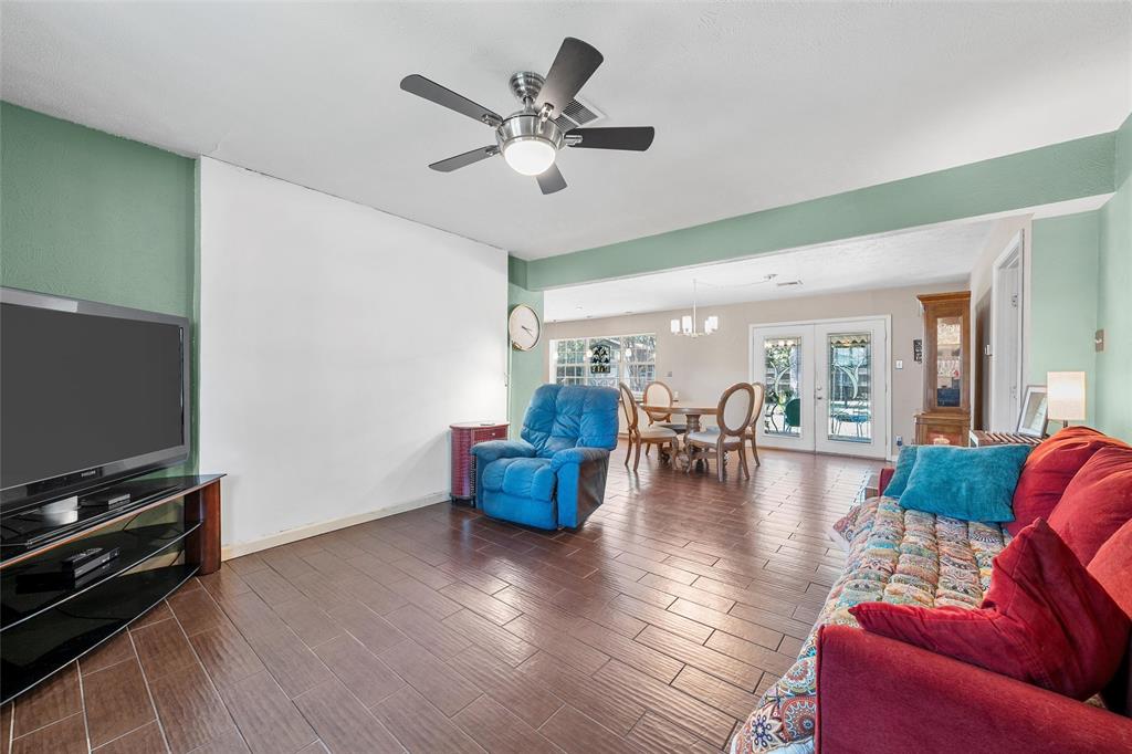 105 Gail Drive Waco, TX 76708 - Photo 23 of 36 a living room with furniture and a flat screen tv