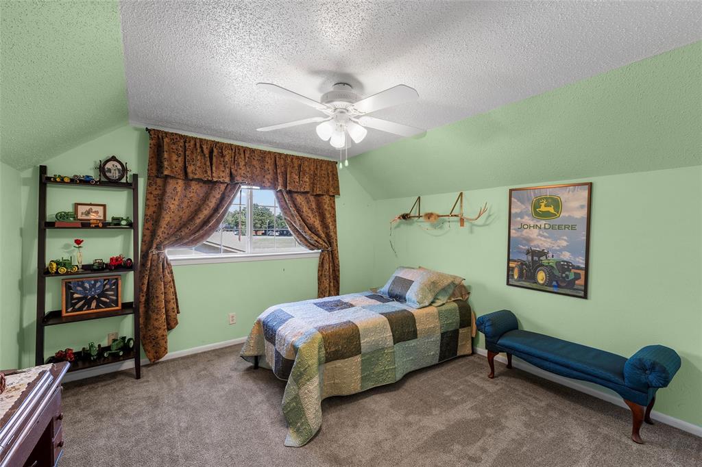 105 Gail Drive Waco, TX 76708 - Photo 27 of 36 a bed room with a bed and a window