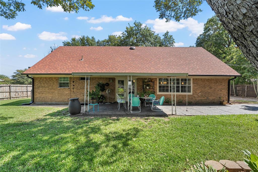 105 Gail Drive Waco, TX 76708 - Photo 34 of 36 a front view of house with yard and outdoor seating