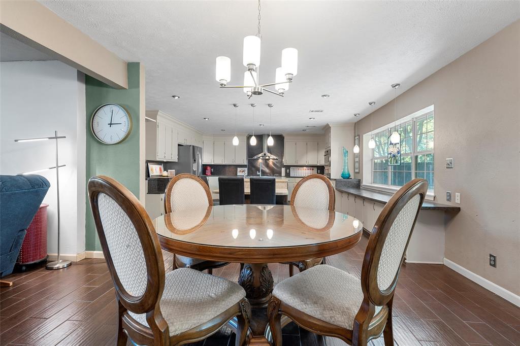 105 Gail Drive Waco, TX 76708 - Photo 5 of 36 a view of a dining room with furniture window and wooden floor
