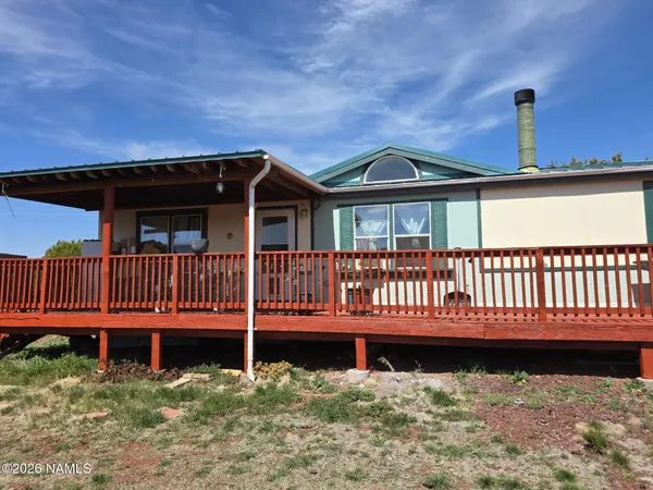 a view of a house with a deck