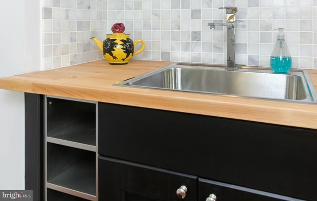 706 E Street Southeast Washington, DC 20003 - Photo 11 of 19 a bathroom with a sink and a bathtub